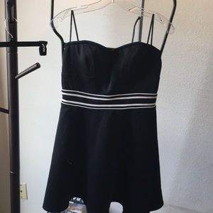 Strapless dress w/ white strips at the waist.